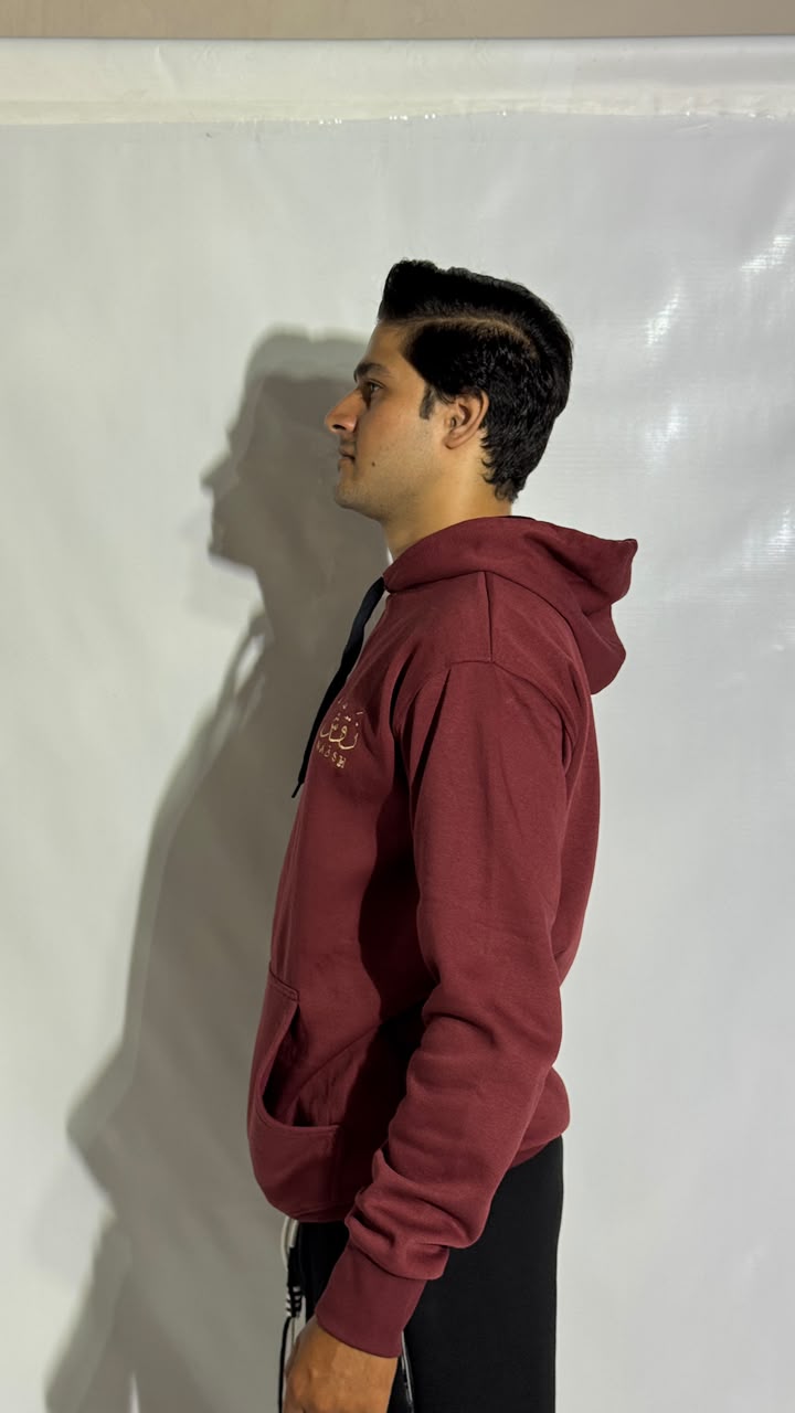 Naqsh Maroon Embroidered Hoodie for Men – Premium Fleece Pullover with Golden Urdu Calligraphy Logo & Kangaroo Pocket