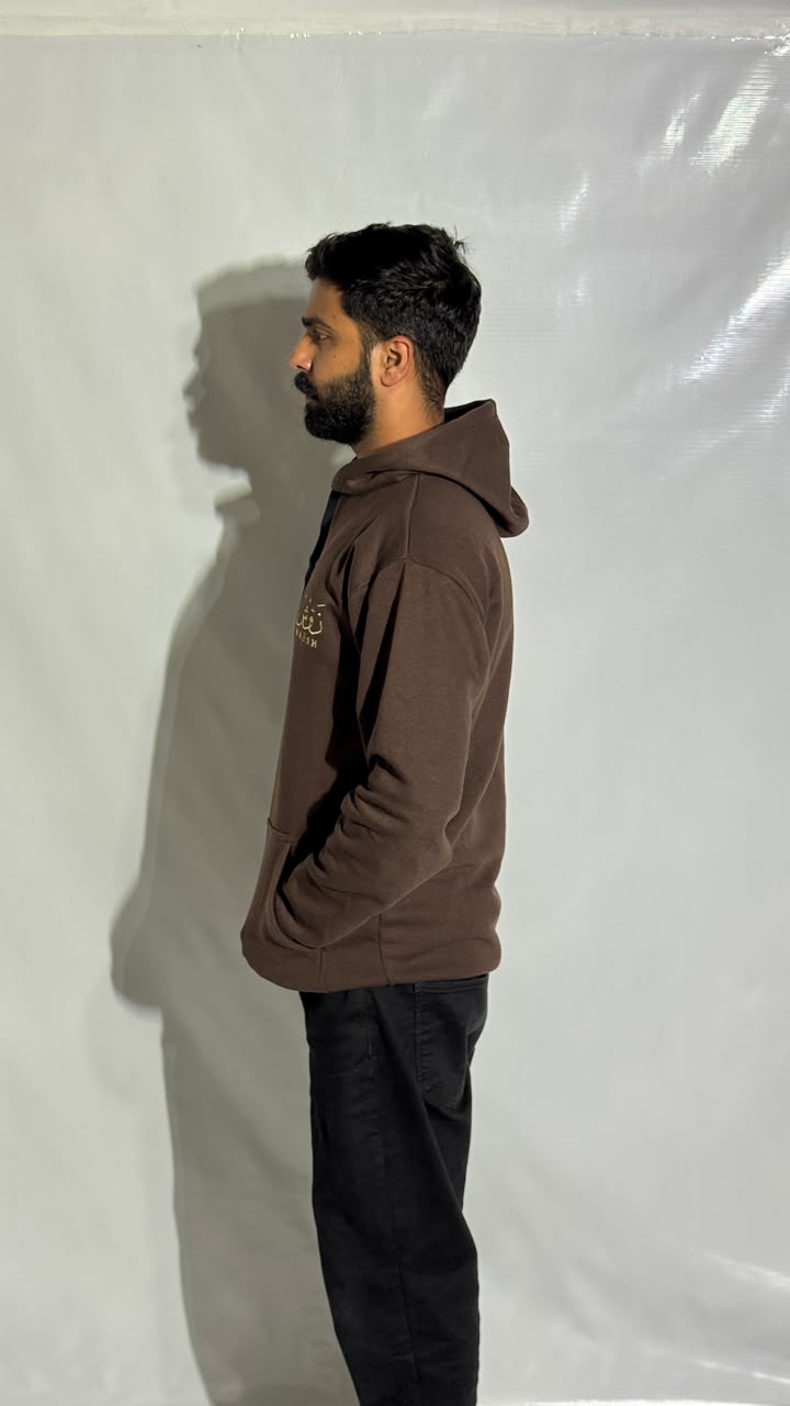 Naqsh Chocolate Brown Embroidered Hoodie for Men – Premium Fleece Pullover with Golden Urdu Calligraphy Logo & Kangaroo Pocket