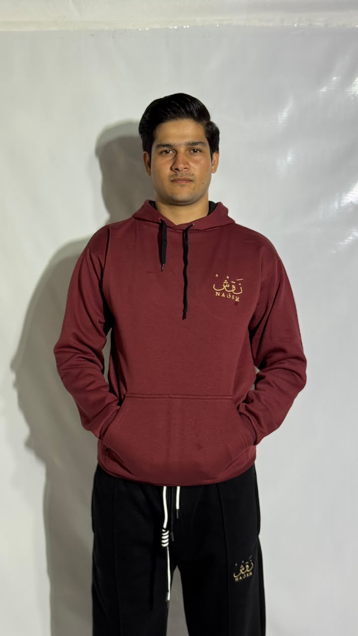 Naqsh Maroon Embroidered Hoodie for Men – Premium Fleece Pullover with Golden Urdu Calligraphy Logo & Kangaroo Pocket