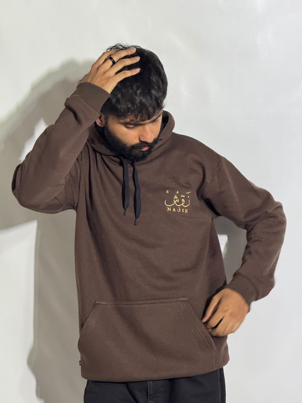 Naqsh Chocolate Brown Embroidered Hoodie for Men – Premium Fleece Pullover with Golden Urdu Calligraphy Logo & Kangaroo Pocket